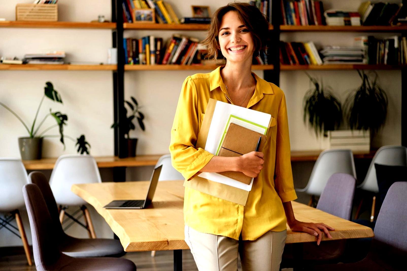 Students reviewing financial planning documents together